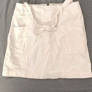 Lined mini skirt with pockets and tie